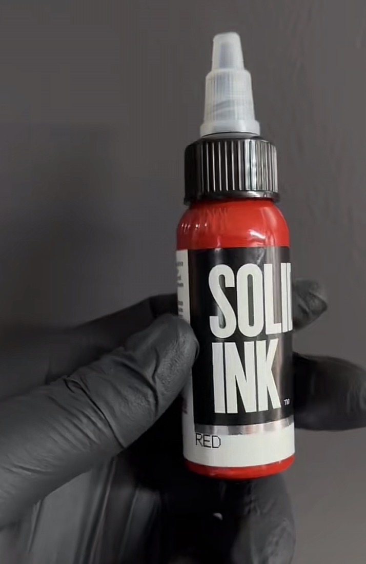 Red tattoo ink
